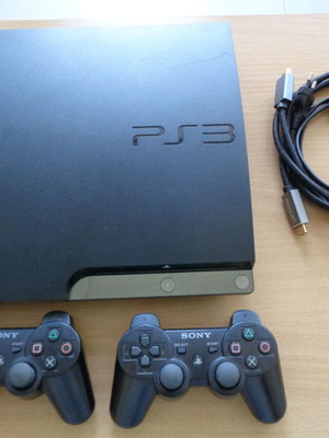 Sony PlayStation 3 Slim CECH-2004B 320GB like new with 2 games
