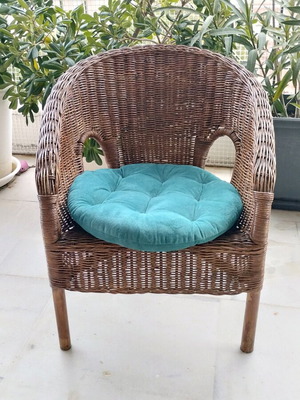 Bamboo children's armchair like new with petrol and red cushions