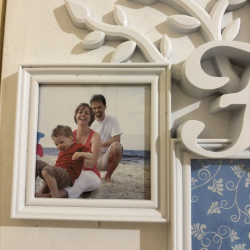 Plastic photo frame Family with 6 openings, like new
