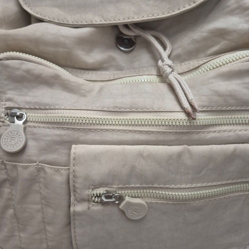 Backpack new beige with multiple pockets