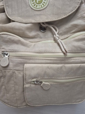 Backpack new beige with multiple pockets