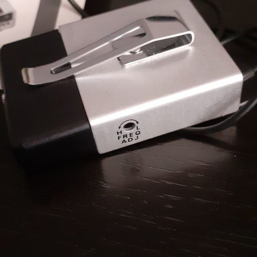 Wireless FM microphone used with case and prospectus