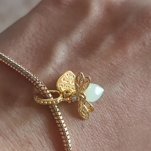 Charm firefly that glows in the dark, new, copper with silver plating
