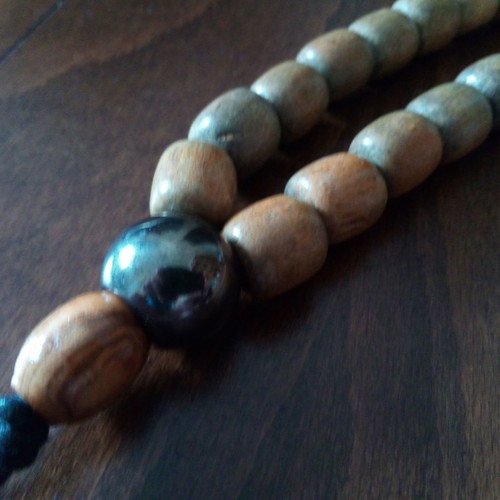 Giant worry beads used, wooden with metal bead