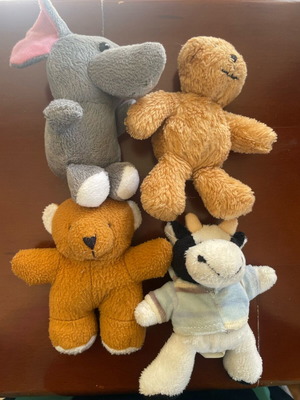 Set of 4 stuffed toys like new