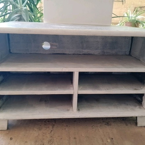 IKEA wooden TV stand used with large storage space