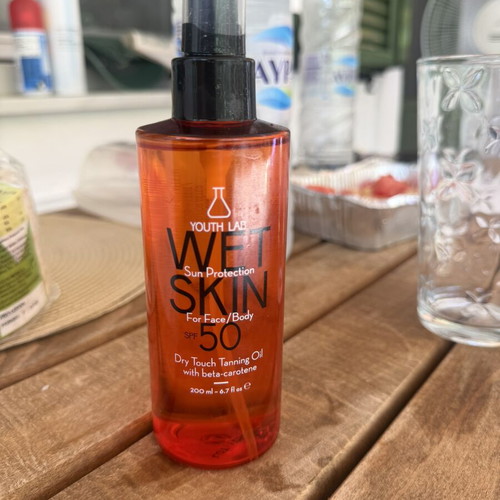 Youth Lab Wet Skin Dry Oil Sunscreen SPF 50 new with beta-carotene