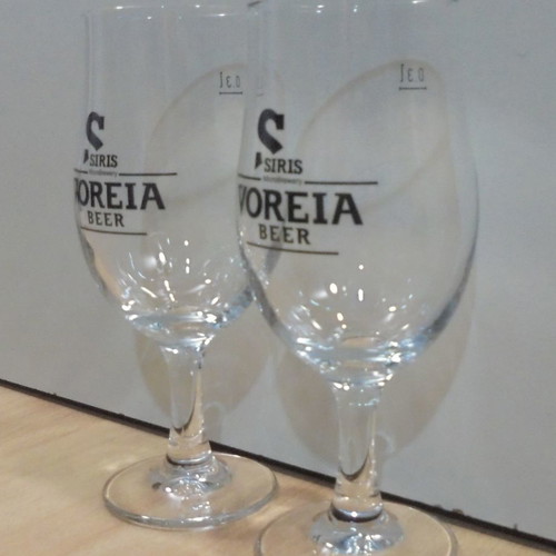 Siris Voreia beer set of two used promotional stemmed glasses 0.3lt