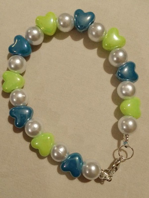 Handmade bracelet with heart beads and white pearls with silver clasp new