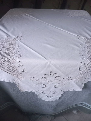Beige tablecloth new with crocheted corners and cutwork details