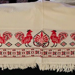 Table linens new, two large embroidered and one rectangular cloth