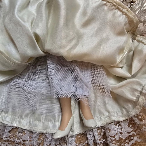 Glass Bride Doll like new with lace dress and hat