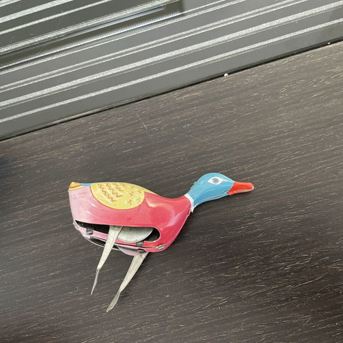 Tin duck vintage toy used with original box, Chinese made
