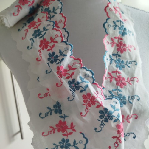 Cotton machine lace with pink and blue flowers