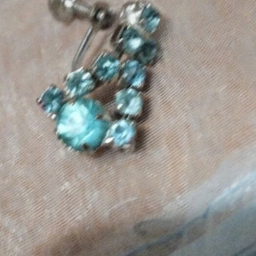 Single earring like new, turquoise, dated 1970