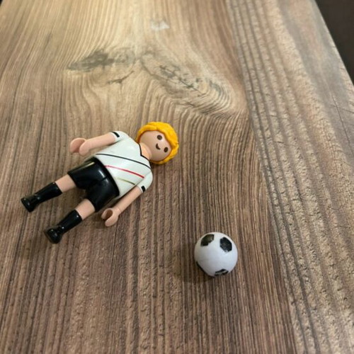 Playmobil footballer like new with faded ball