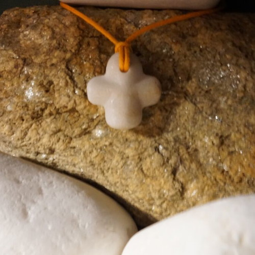 Collectible Cycladic marble and stone cross pendant, hand-carved