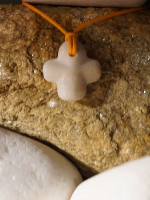 Collectible Cycladic marble and stone cross pendant, hand-carved