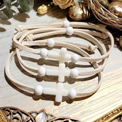 Handmade martyrika bracelets with suede cord and white cross