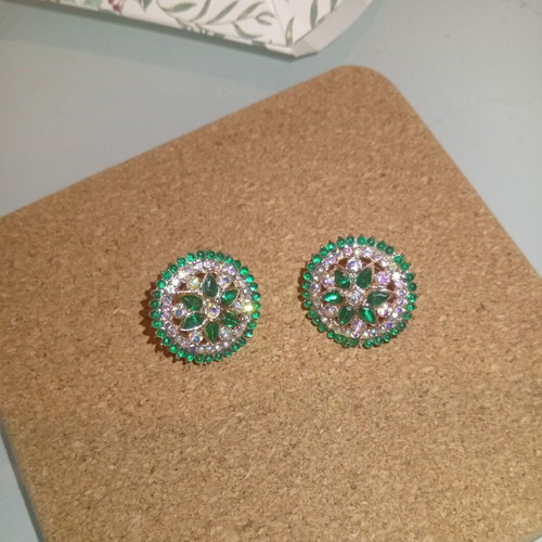 Round stud earrings with green and clear stones