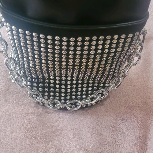 Shoulder bag like new, small black with shiny silver ornaments