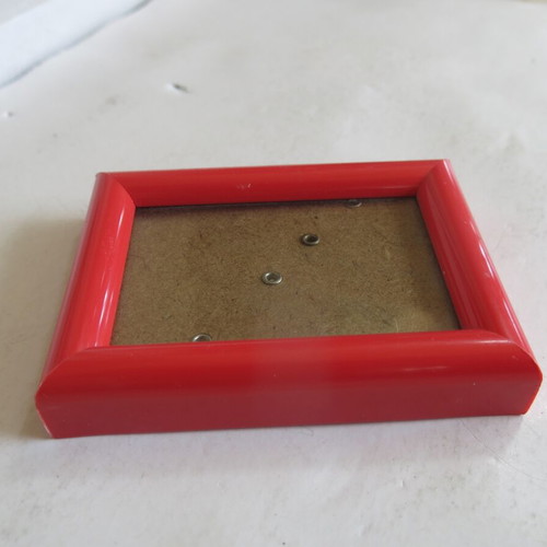 Small red photo frame new with stand and wall hooks