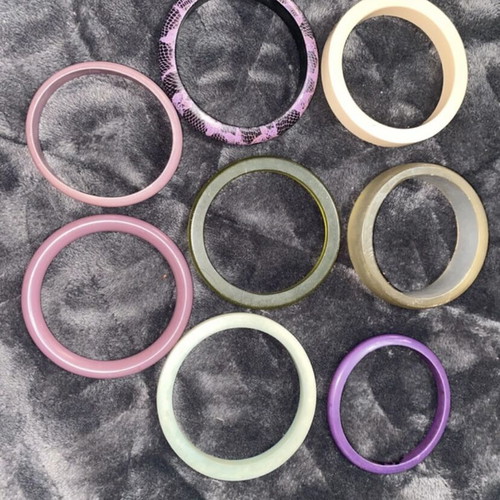 Bracelets new, wooden, plastic and iron multicolor