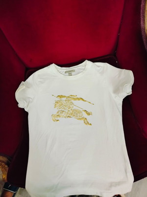 Burberry women's blouse used with slight discoloration on neckline