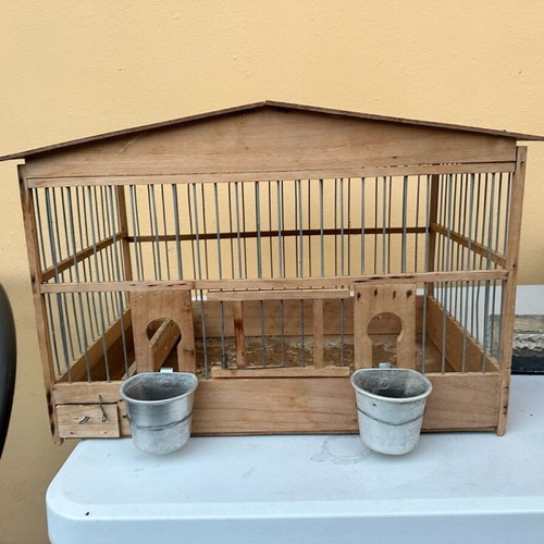 Wooden birdcage used for canaries or small birds