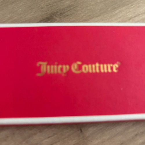 Juicy Couture bracelet with charms, like new, gold tone