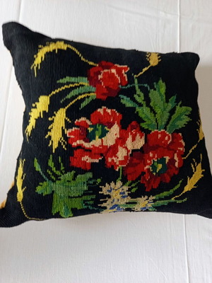 Vintage decorative sofa pillow with handmade embroidery and buttons used