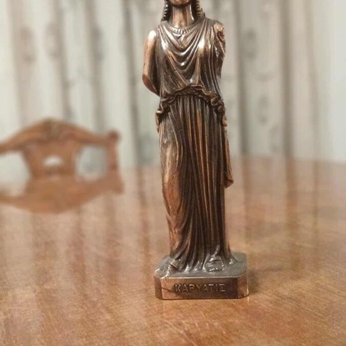 Caryatid metal statue like new