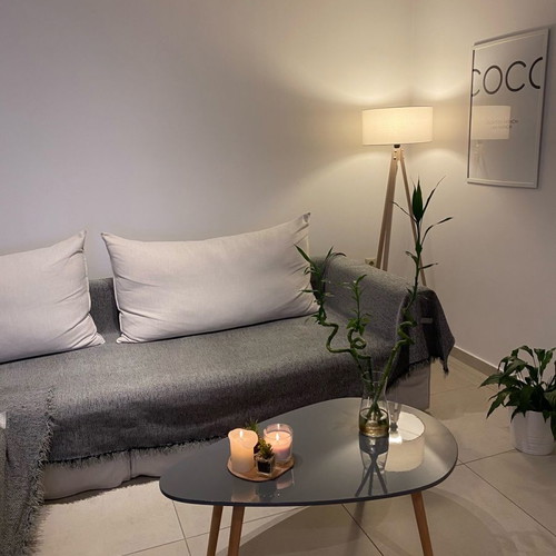 Coffee table new gray with glossy lacquer surface and solid legs
