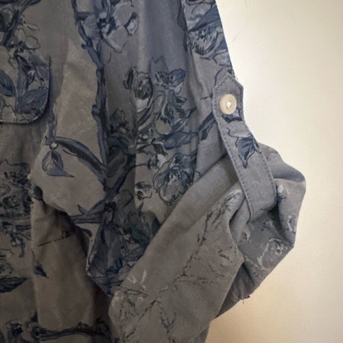 Blue shirt used with button on sleeve