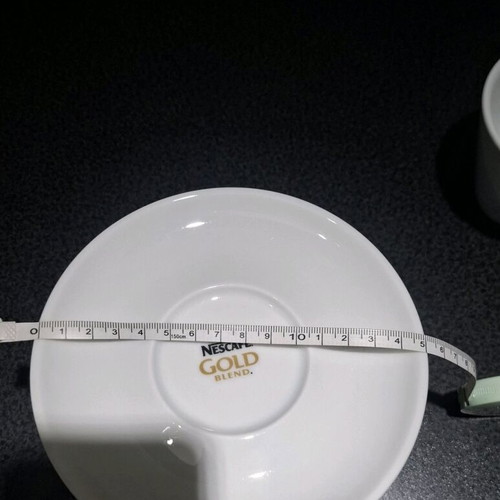 Nescafé Gold porcelain cup and saucer set new