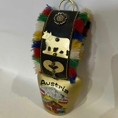 Vintage hanging souvenir bell from Austria used with colorful designs and metal elements