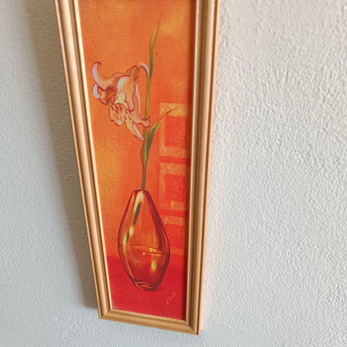 Decorative framed canvas print used, flower in glass vase