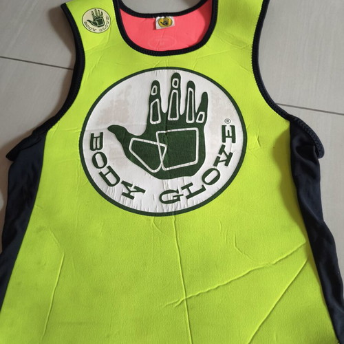 Neoprene vest used by Body Glove for water sports protection