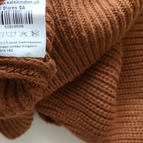 KATELONDON sleeveless women's sweater with high collar, tan