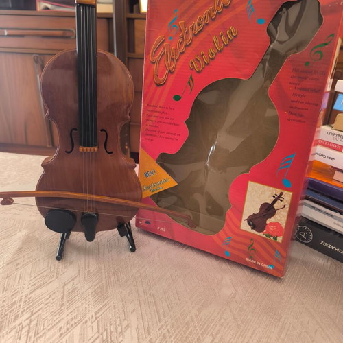 Decorative violin with plastic stand like new