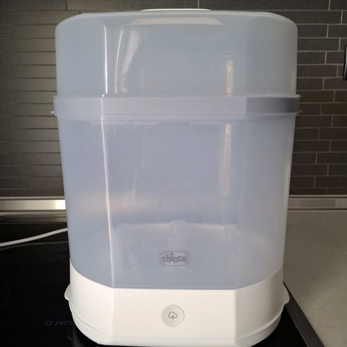 Chicco sterilizer like new, two levels for bottles and accessories