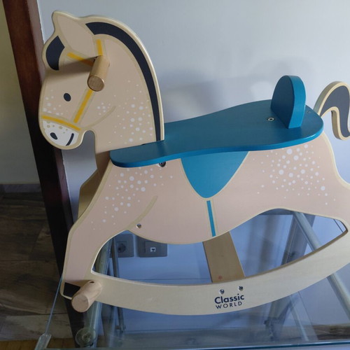 Wooden rocking horse like new, from 1 year old