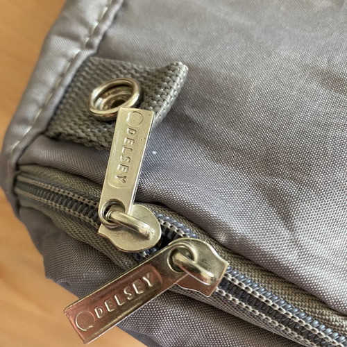 Delsey Paris large travel toiletry bag used, gray