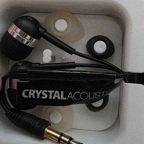 Crystal Acoustics wired in-ear headphones with extra ear tips and case