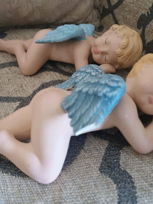 Handmade ceramic angels used with small broken wing piece