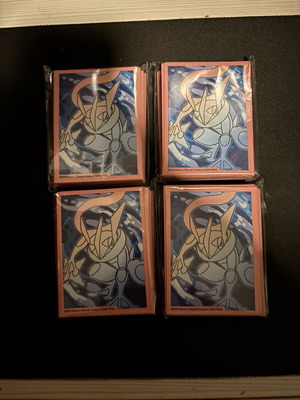 Pokemon Chaos Rising card sleeves, 4 sealed packs