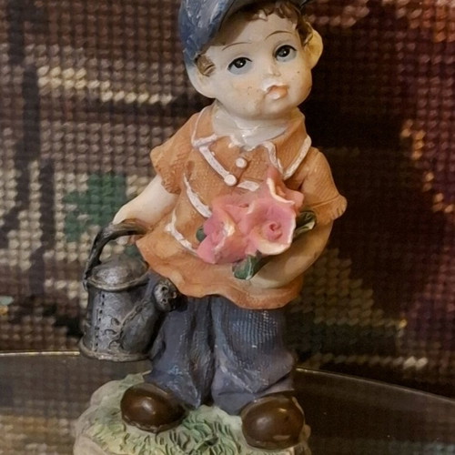 Vintage boy figurine used