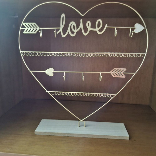 Jewelry stand with multiple compartments, gold color