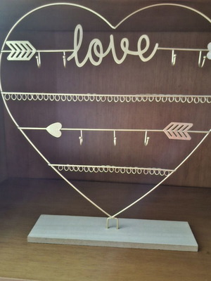 Jewelry stand with multiple compartments, gold color