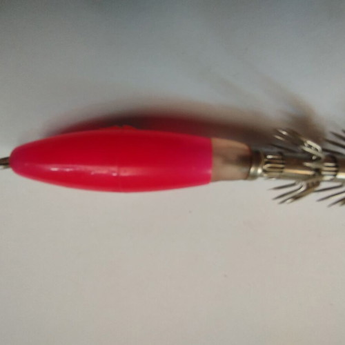 Mega squid jigs orange plastic 6cm new, hard with two rows of needles